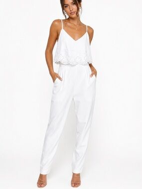 NWT Bebe Shana Jumper Ella Bow Jumpsuit Bright White Embroidered Eyelet Size 2